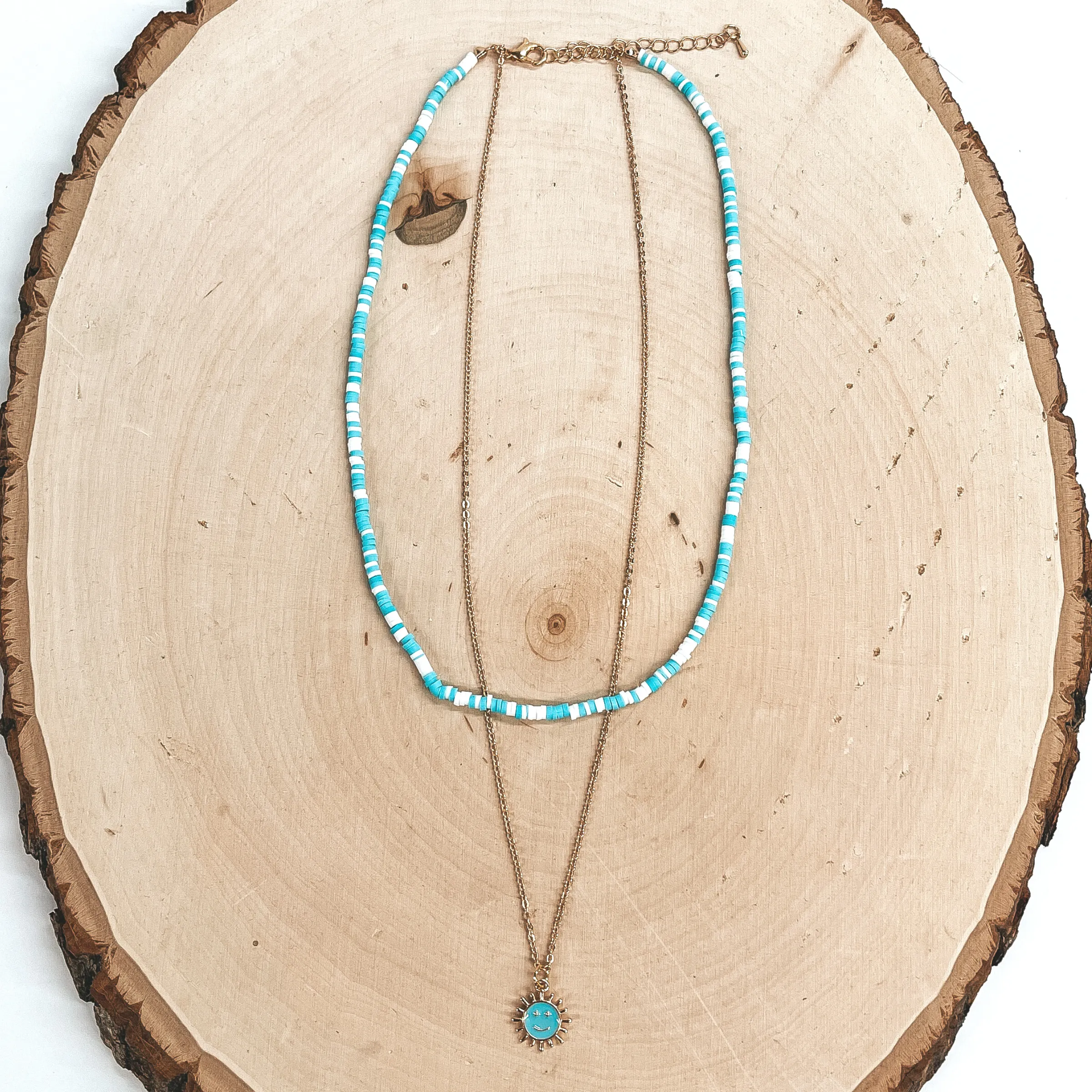 Double Layered Disc Beaded Necklace in White and Turquoise with Happy Face Sun Pendant