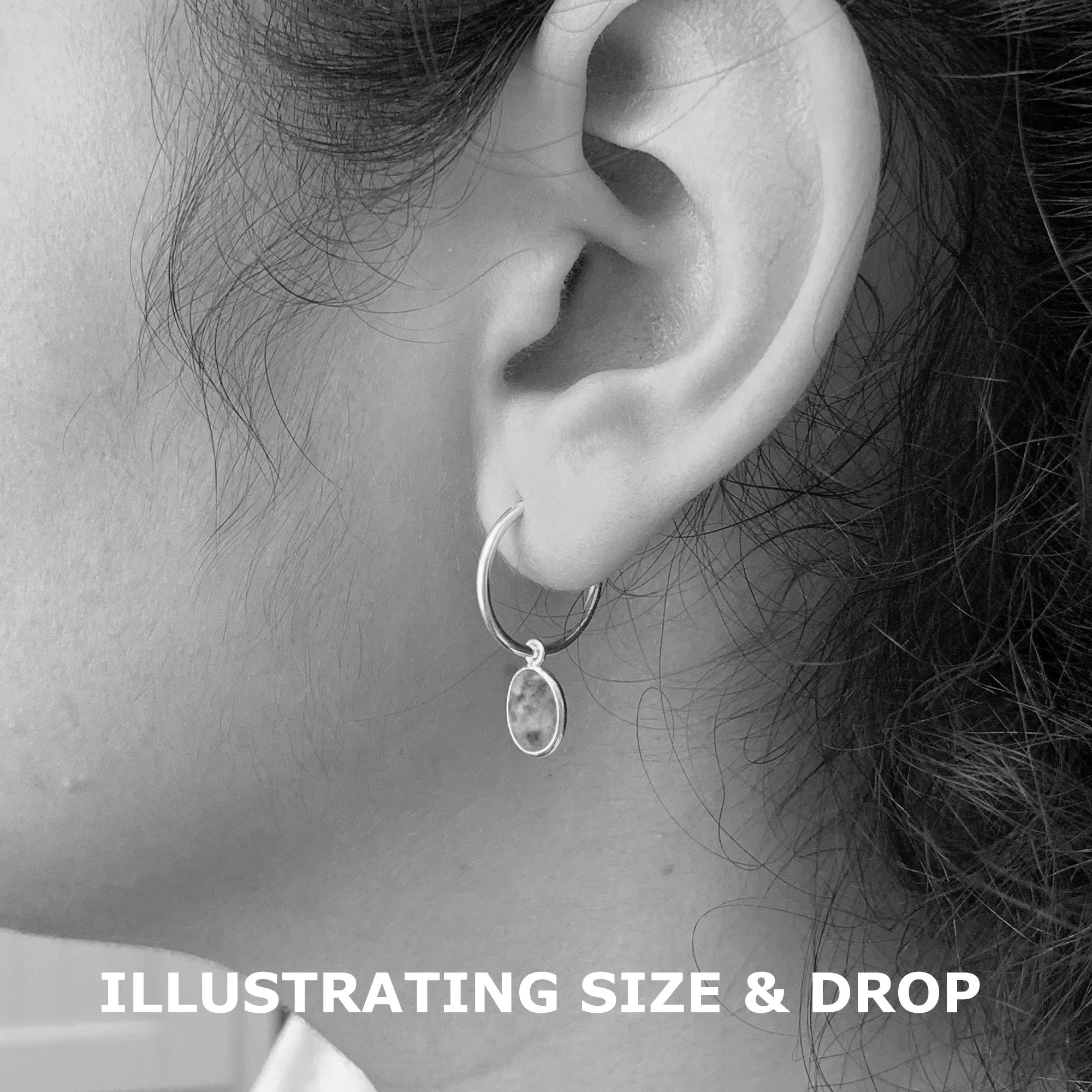 Gemstone earrings with turquoise (blue) oval crystal drops on silver small hoops
