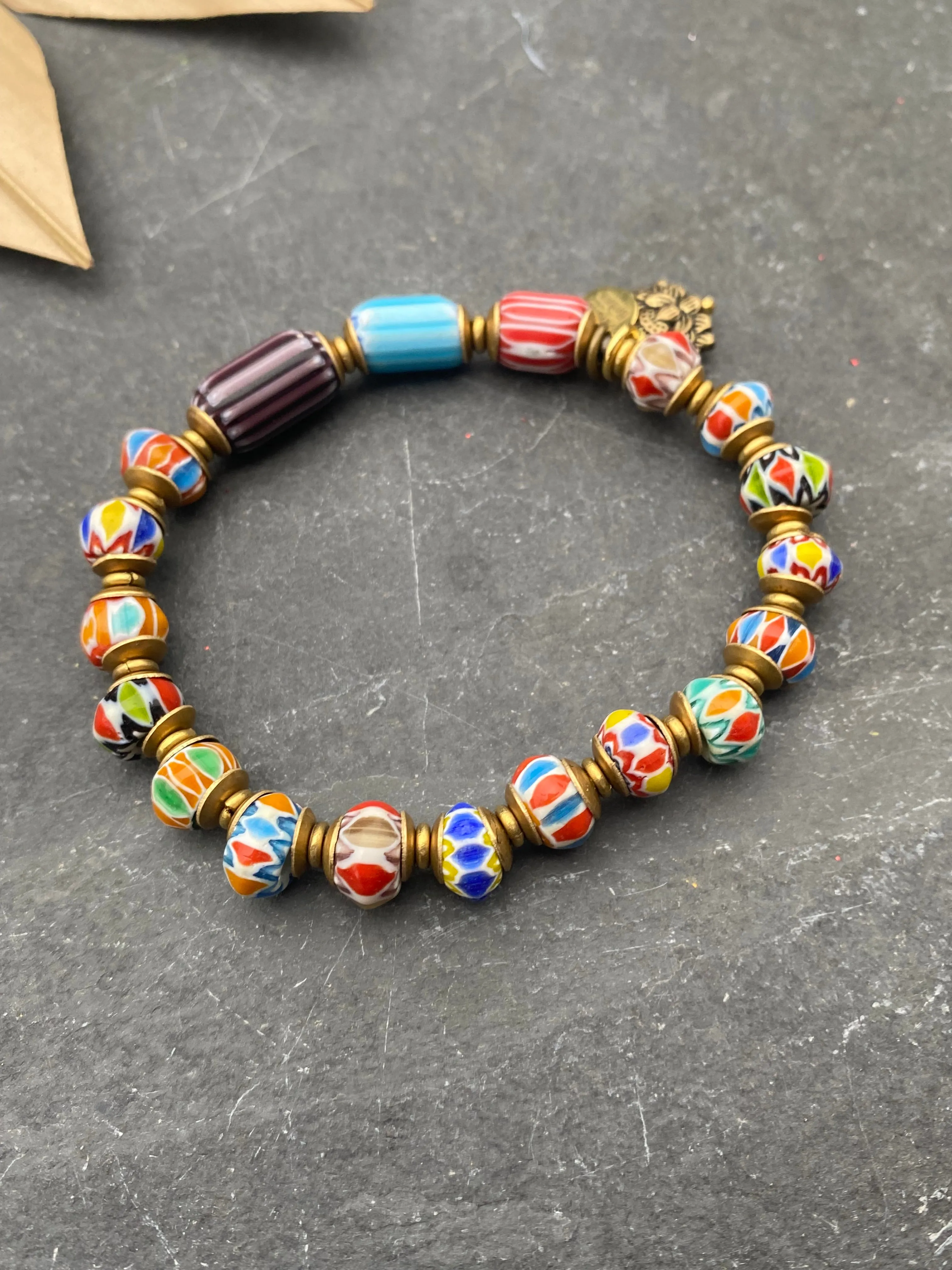 Indonesian glass, African brass, elastic cording, bracelet, jewelry