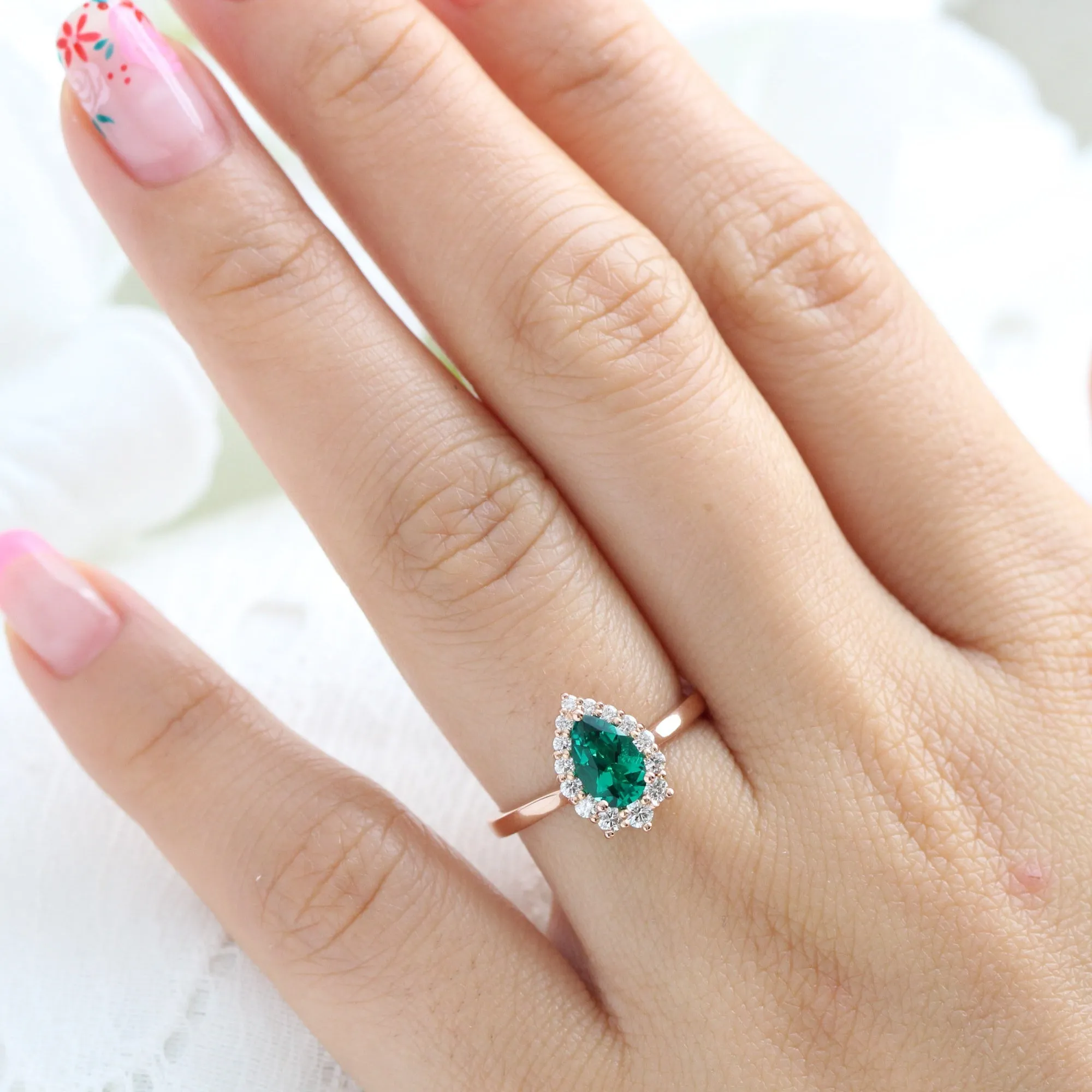Pear Emerald Engagement Ring in Tiara Halo Diamond Tapered Band